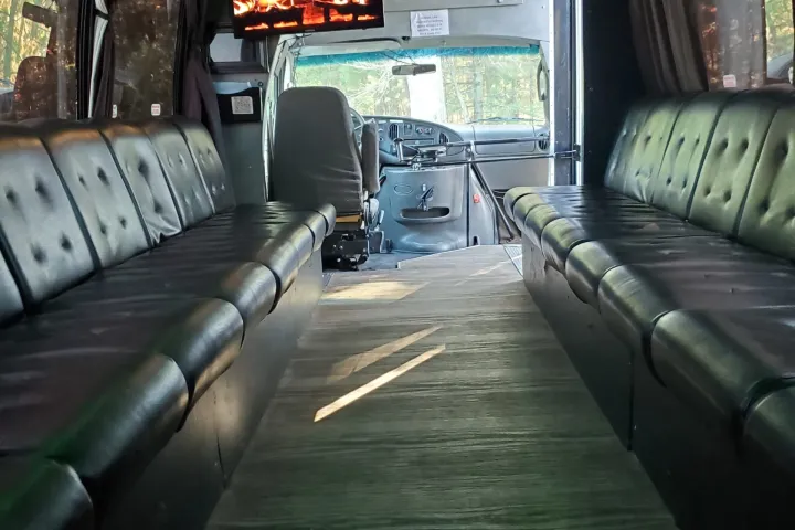 a train is parked on the side of a building