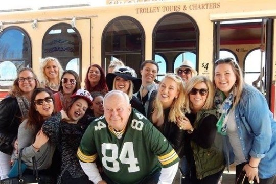 Group posing in front of the Wisconsin Dells Trolley